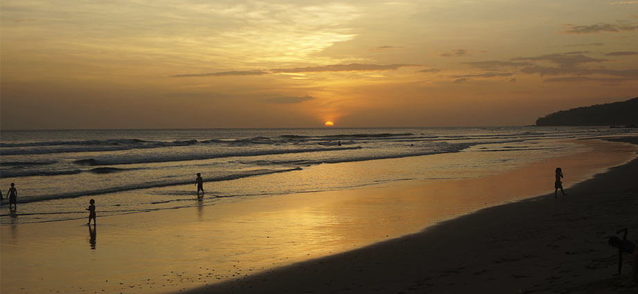 surfing at playa grande