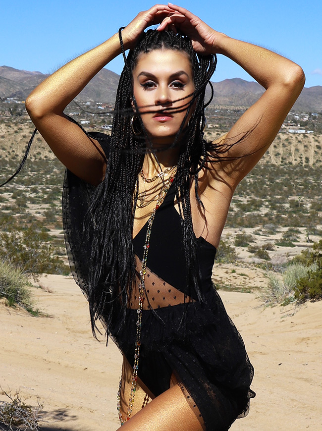 shop-desert-tribe-peacock-bodysuit-sand-look-in-camera-close-up